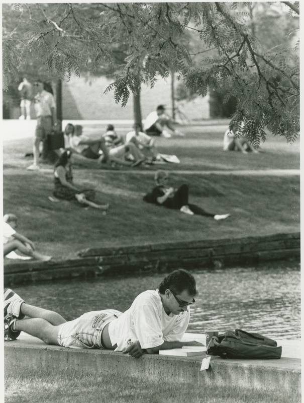 Students relaxing on the lawn